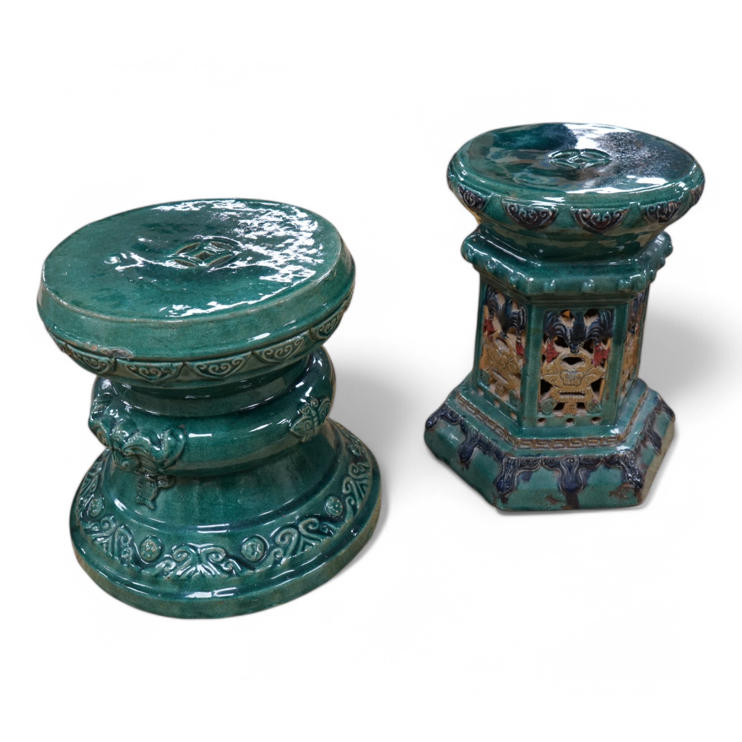Two Chinese ceramic turquoise glazed garden seats, largest 41cm high. Condition - fair